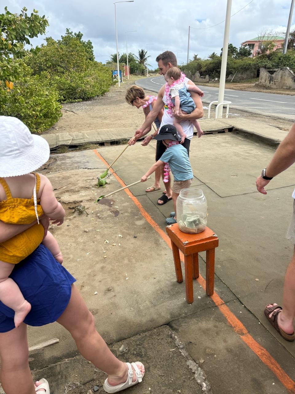 Feeding the iguanas — the kids' favourite stop of the day.